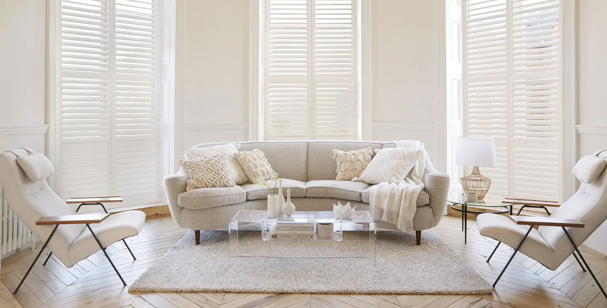 Shutters in cream living room.