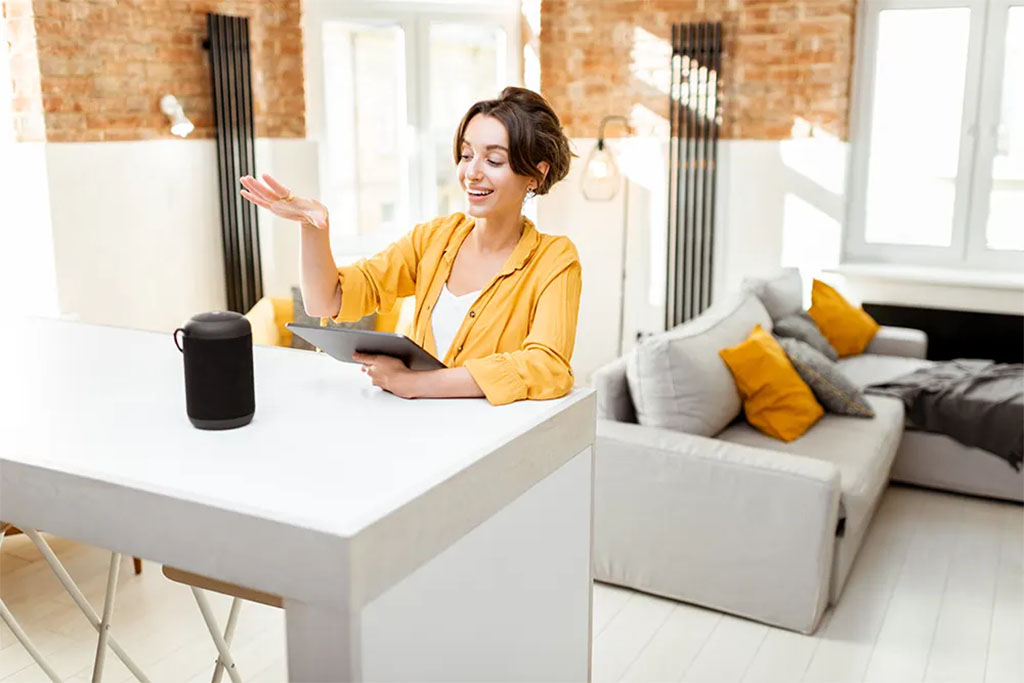 Woman controlling smart devices with her voice