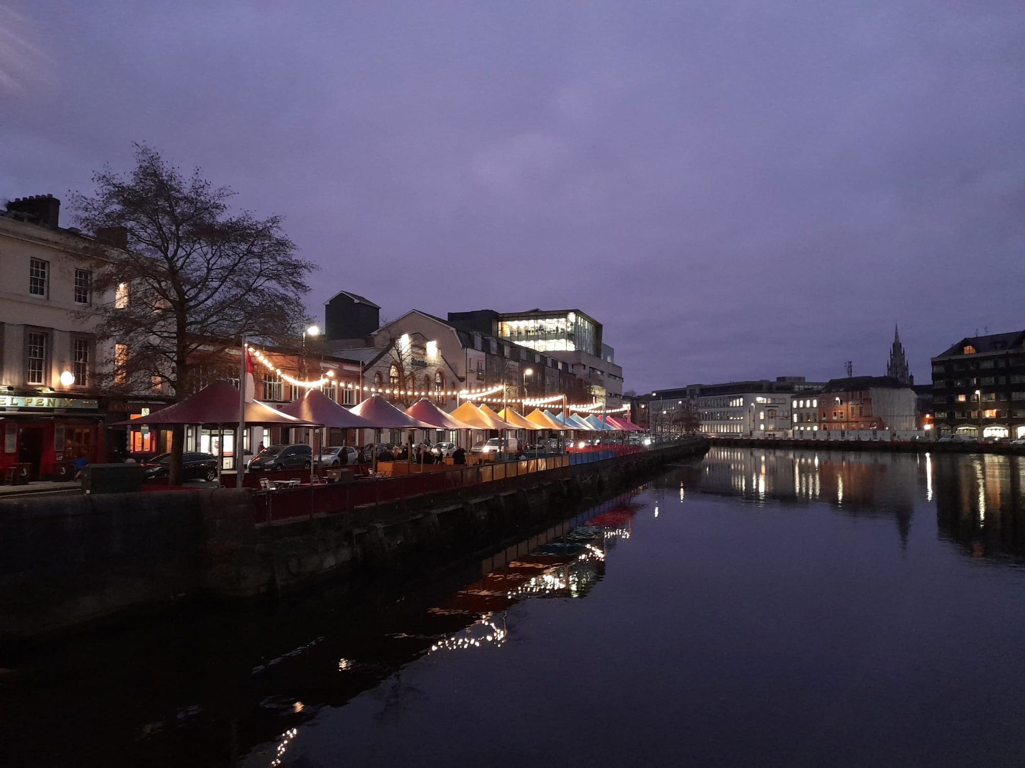 Commerical parasols lining the river.