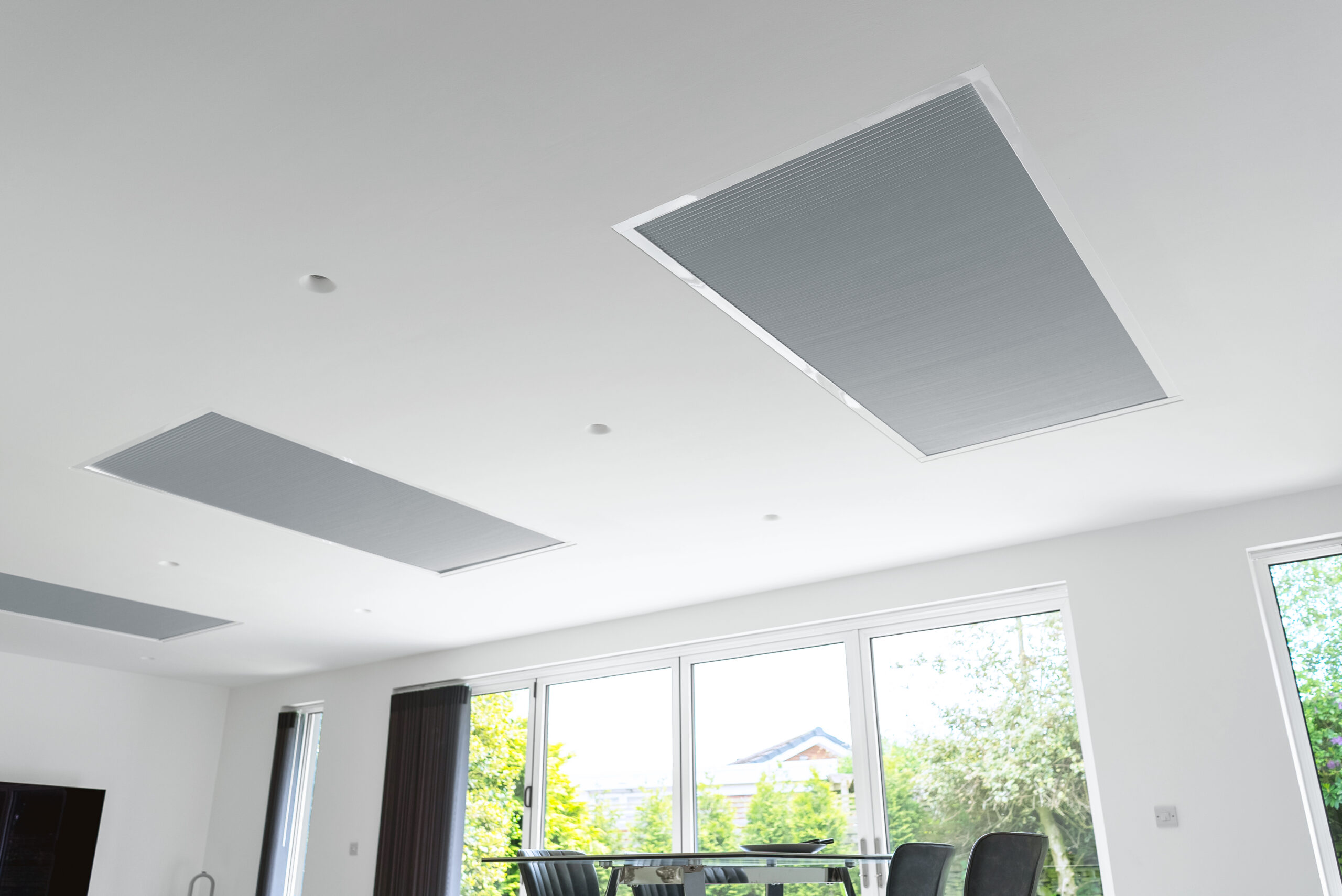 Closed Lanern roof blinds in a dining room